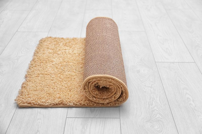 aplatir un tapis